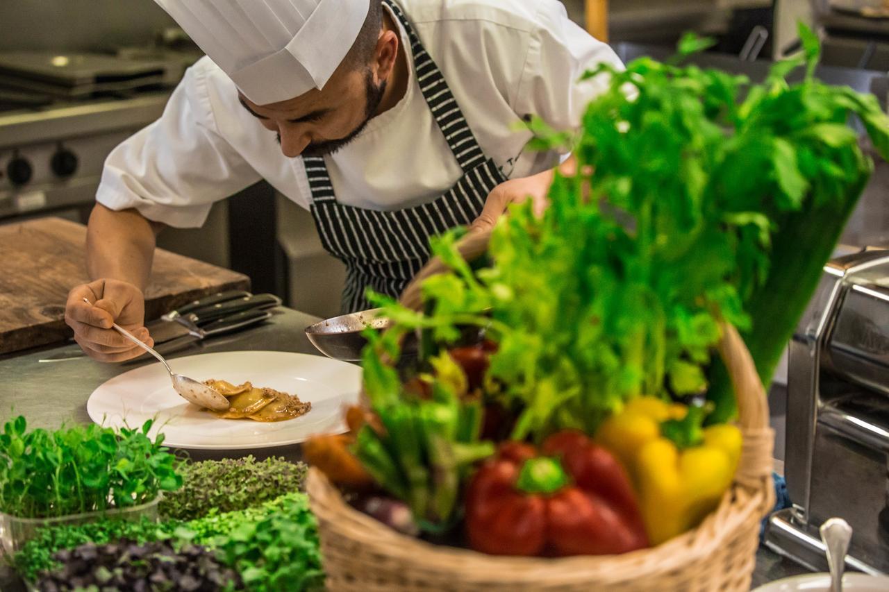 Bagni Di Pisa Palace & Thermal Spa - The Leading Hotels Of The World San Giuliano Terme Exterior photo A chef preparing a dish
